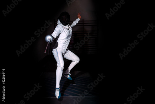 Person Practicing with Fencing Rapier