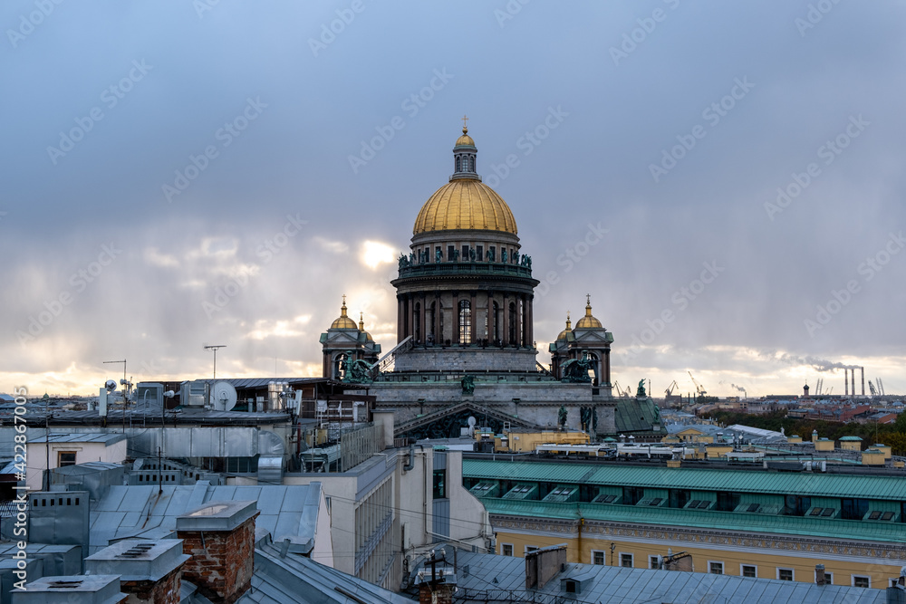 the old roof of St. Petersburg in daylight with a view of the cathedral