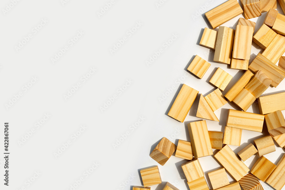 Wooden building blocks on white background. Wooden building blocks on white background.
