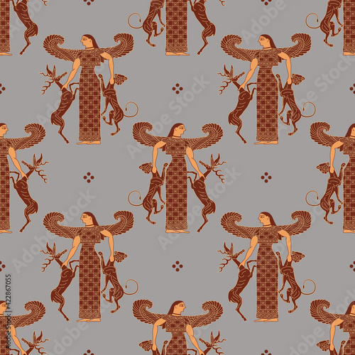 Seamless geometrical pattern with silhouettes of ancient Greek winged goddess Artemis Potnia Theron holding two animals. Ethnic style. Based on antique vase painting image. photo