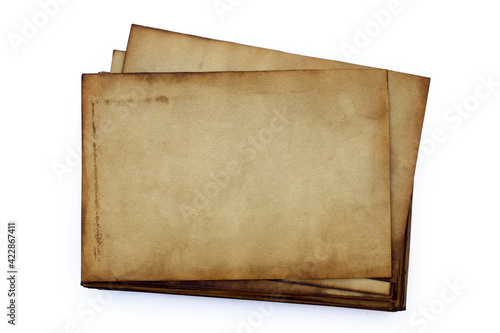 Stack of old papers isolated on white