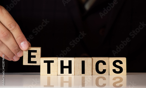 Fotografi ETHICS word on wooden cubes, business concept