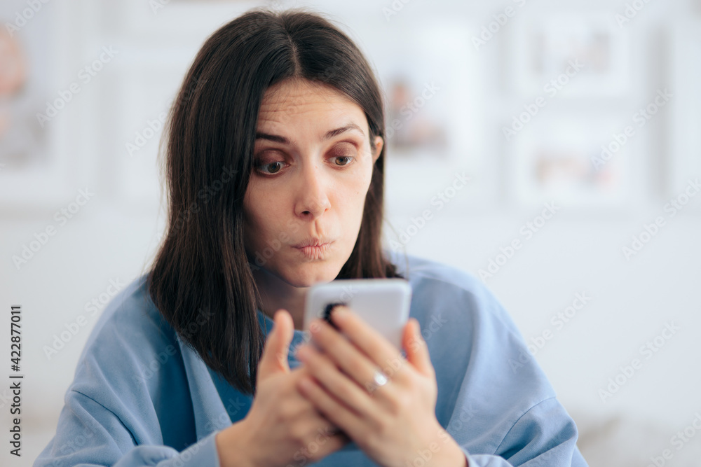 Funny Woman Holding Smartphone at Home Funny Woman Holding Smartphone at Home