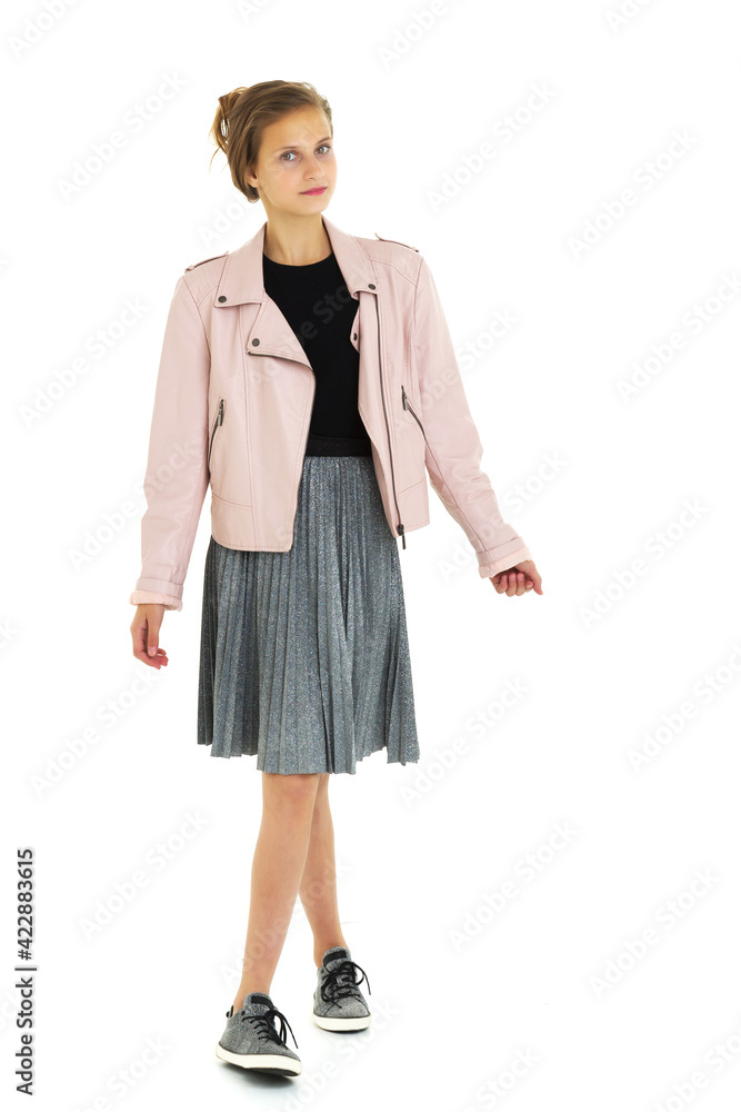 Beautiful teenage girl in stylish outfit. Studio portrait. Beautiful teenage girl in stylish outfit. Studio portrait.
