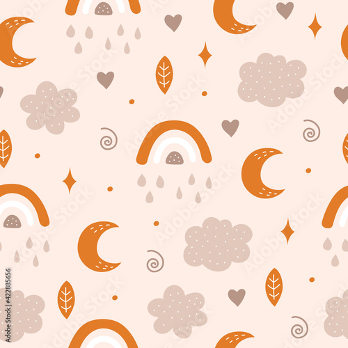 Seamless pattern with moon, cloud and rainbow in the sky.