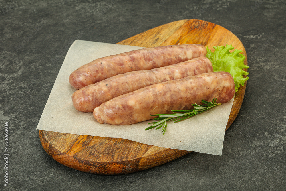 Raw pork meat sausages for grill