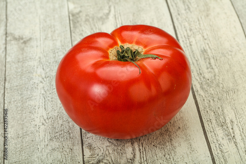 Ripe big juicy red tomato