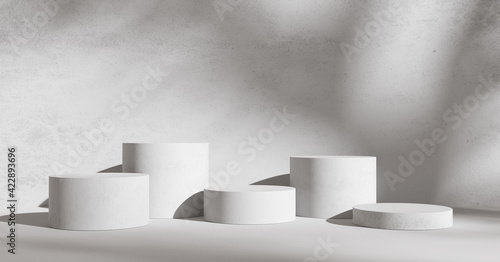 White product display podium with shadow nature leaves on white background. 3D rendering