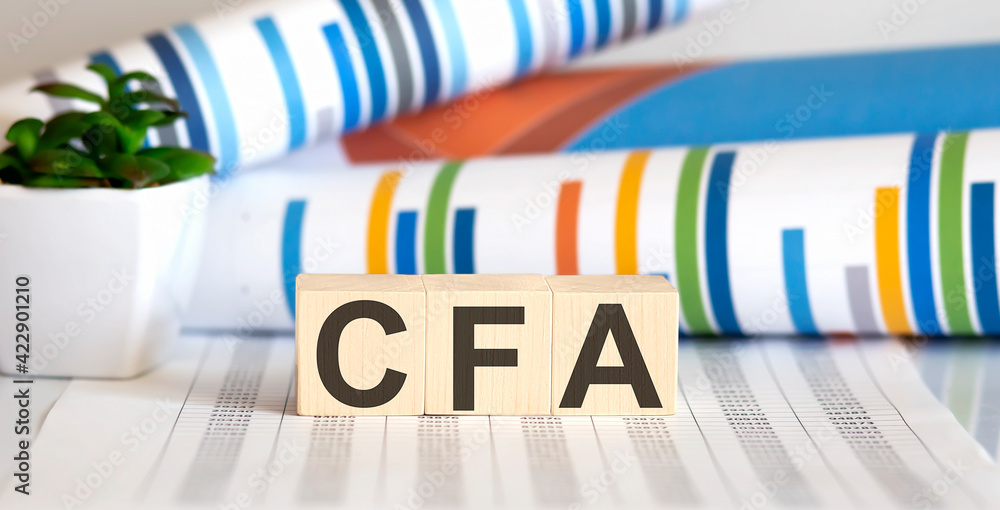 cubes with the word CFA on chart, concept.