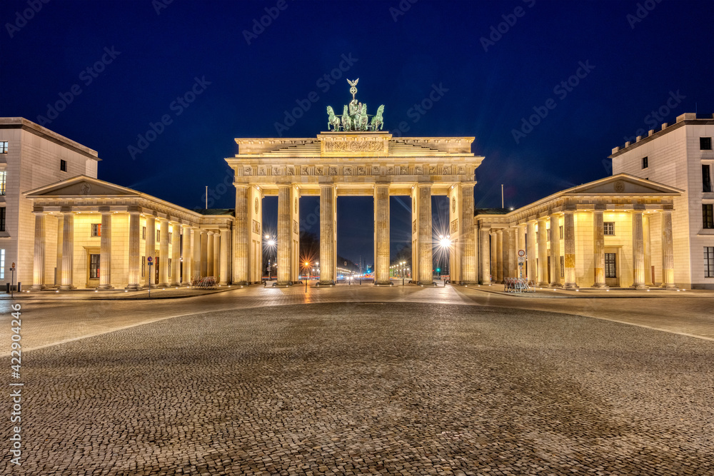The illuminated Brandenburg Gate in Berlin at night The illuminated Brandenburg Gate in Berlin at night