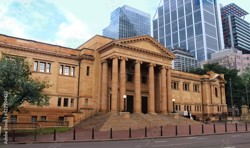 Cityscape with the State Library of NSW also known as Mitchell Library. Historic sandstone library with the city in the background. Sydney City