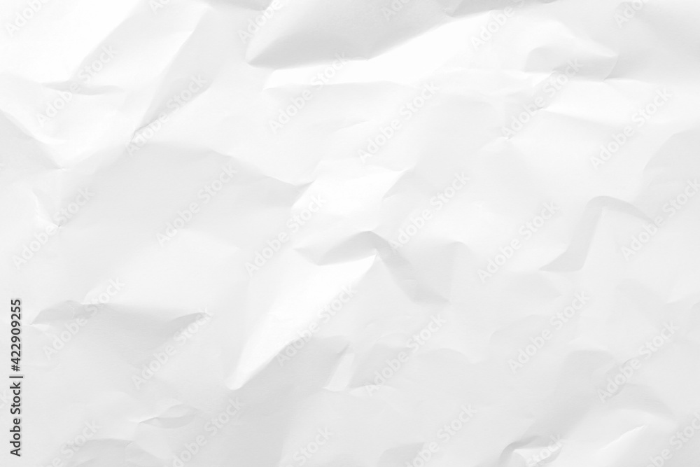 Obraz premium White crumpled paper texture background.