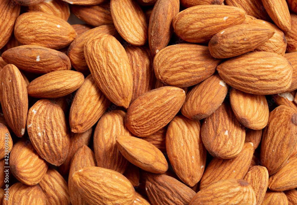 Close up of almond nuts as background. Close up of almond nuts as background.
