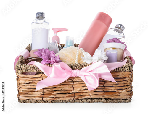 Gift basket with cosmetics on white background