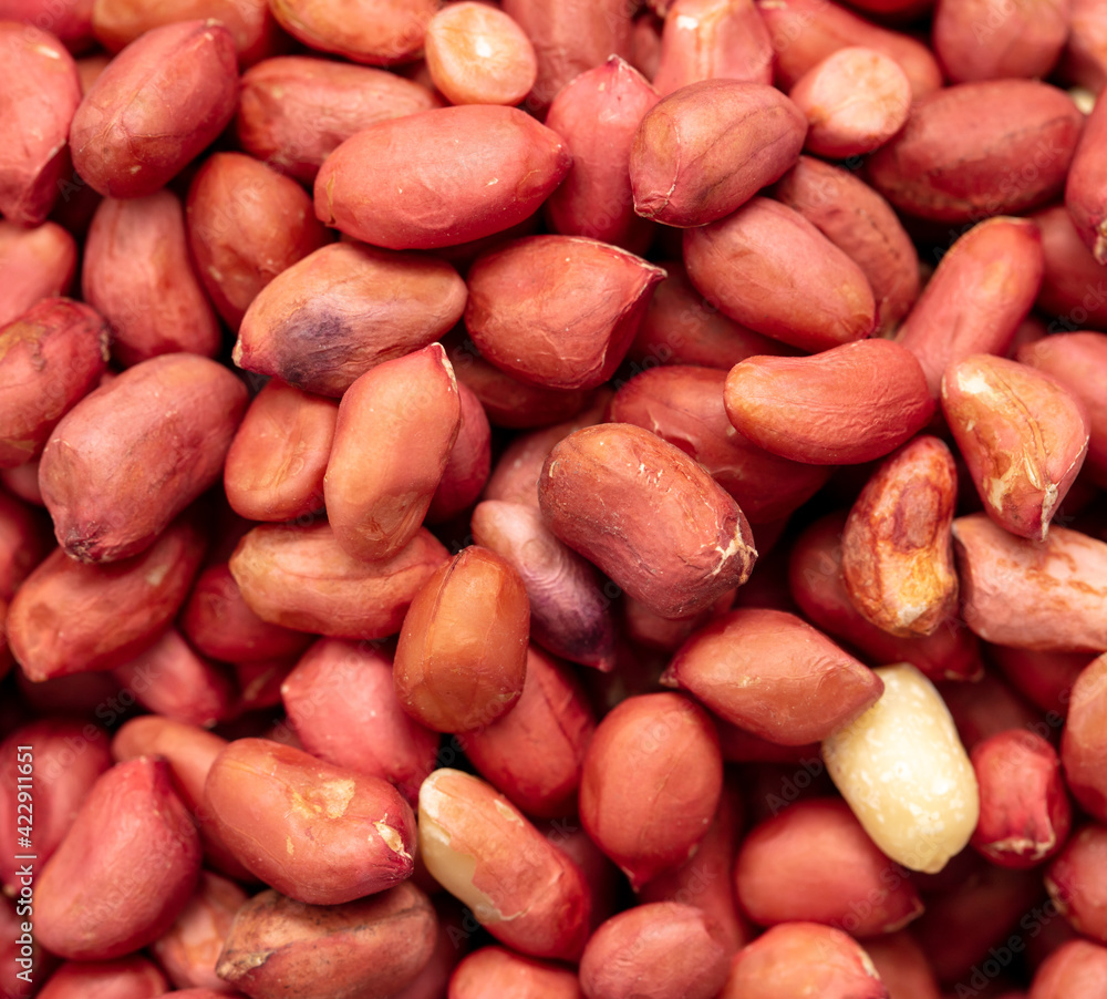 Close up of peanut nuts as background. Macro Close up of peanut nuts as background. Macro
