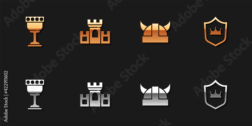 Set Medieval goblet, Castle, fortress, Viking in horned helmet and Shield with crown icon. Vector