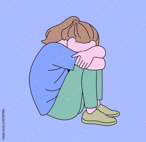 A girl is sitting with her knees raised and buried her face in her knees. hand drawn style vector design illustrations. 