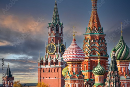 St. Basil’s Cathedral and Spassky Tower on Red Square in Moscow. Orthodox church and architectural masterpieces of Moscow. Most famous sights of Russia. Life before pandemic COVID-19