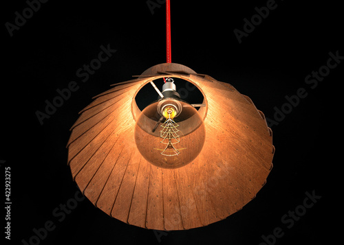 3d rendering of a pendant lamp with a decorative warm light lamp