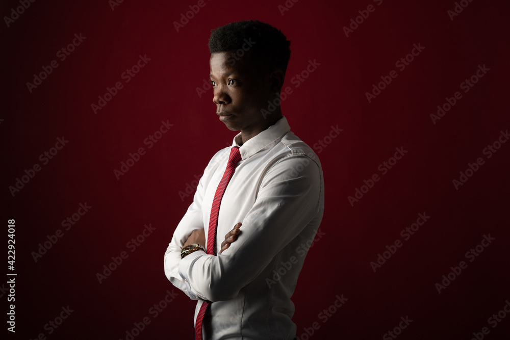 portrait of handsome young african man wearing white shirt portrait of handsome young african man wearing white shirt