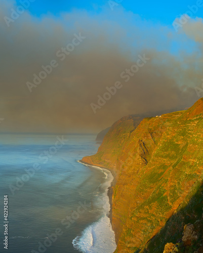 Smoke burning forest ocean ...