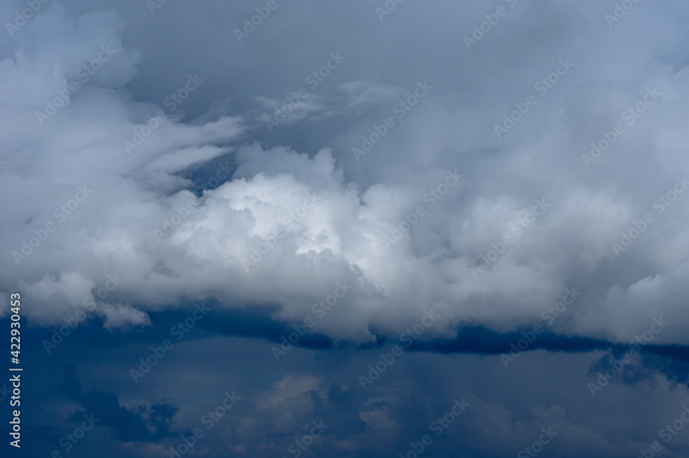 Cumulus clouds in a blue sky. Cumulus clouds in a blue sky.