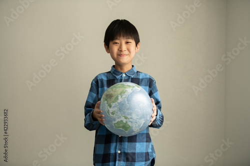 Elementary School Student Thinking about Environmental Problems photo