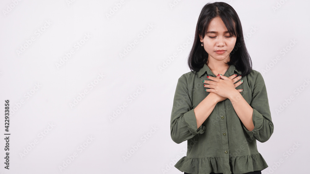 a Christian woman praying humbly isolated white background a Christian woman praying humbly isolated white background