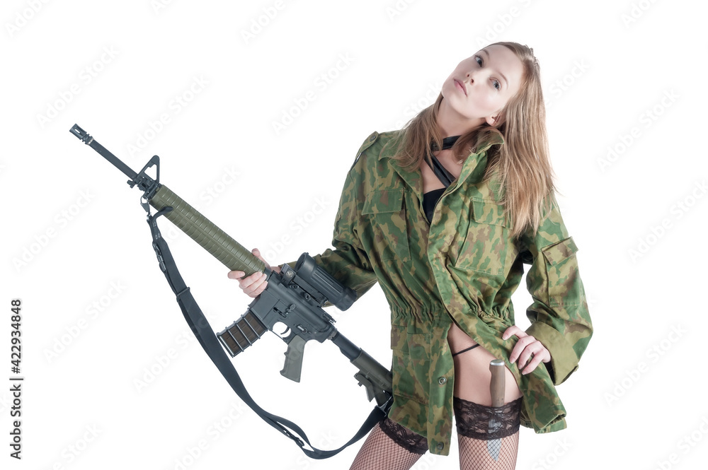 Pretty woman with gun and knife over white Pretty woman with gun and knife over white