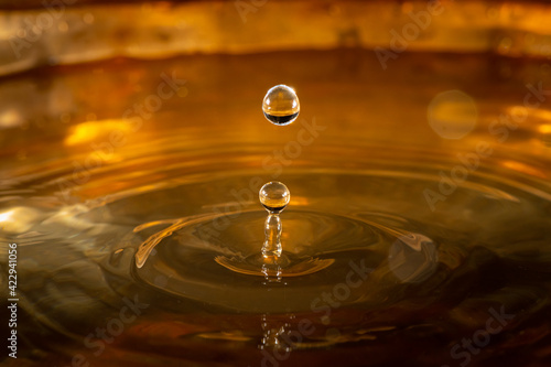 A couple of water droplets hitting the surface