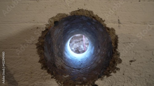 Camera moving in a hole after drilling with a core driller photo