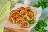 Puff pastry mini sausage rolls with ground beef