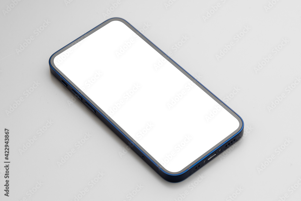 Modern smartphone with blank white screen on gray background Modern smartphone with blank white screen on gray background