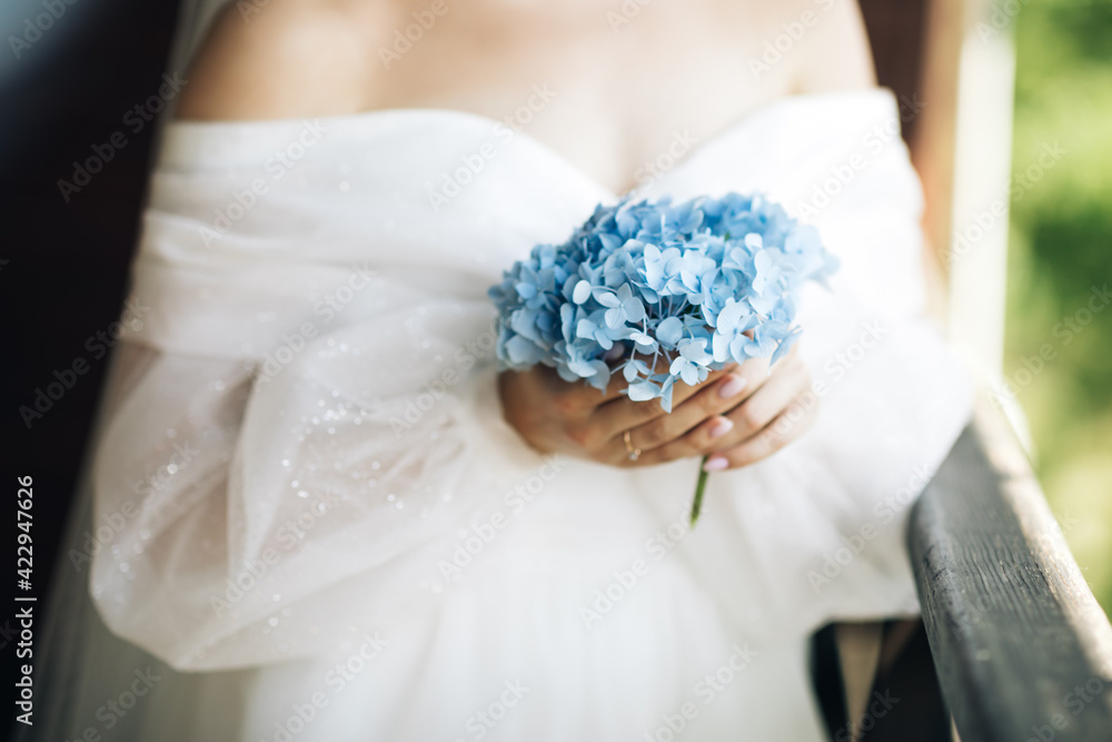 Bride holding beautiful wedding flowers bouquet. Bride holding beautiful wedding flowers bouquet.