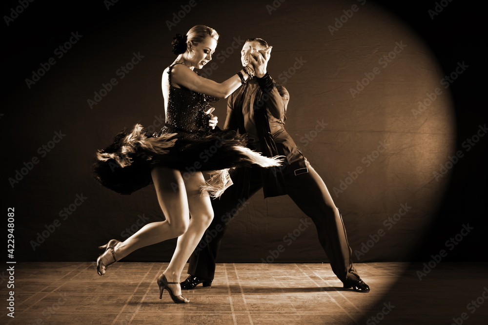 Dancers in ballroom isolated on black background Dancers in ballroom isolated on black background