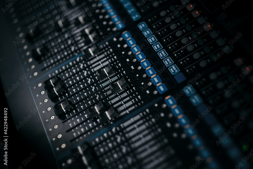 audio sound mixer controller at studio in dark background audio sound mixer controller at studio in dark background