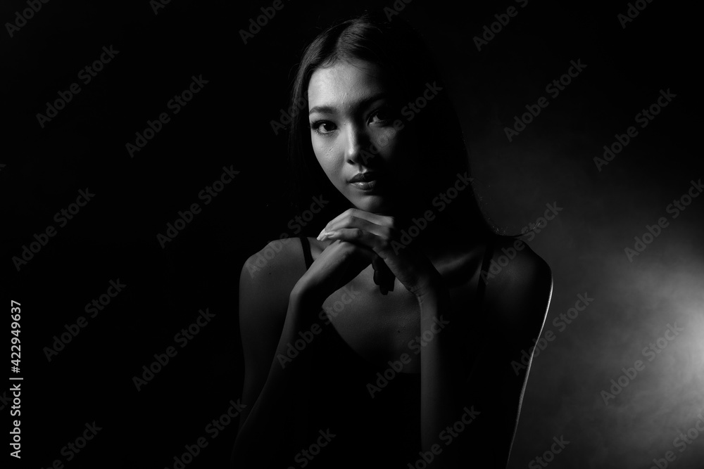 Asian girl shows Eyes Face expression over Black & White