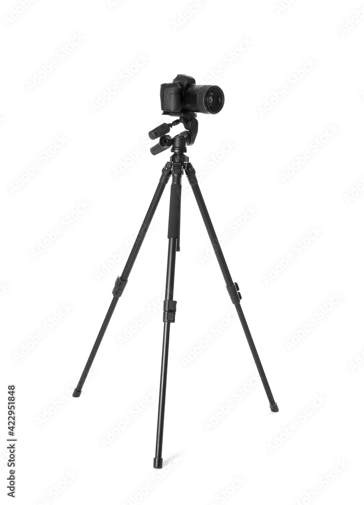 Modern tripod with camera isolated on white Modern tripod with camera isolated on white