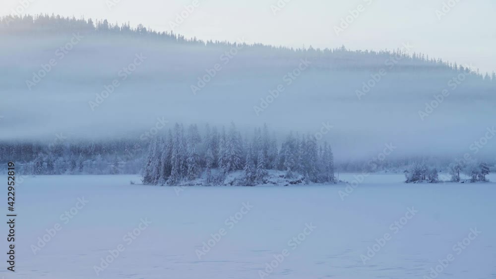 Clouds With Fog Rolling Over Forest And Mountain At Winter Near Trondheim, Norway. - timelapse Clouds With Fog Rolling Over Forest And Mountain At Winter Near Trondheim, Norway. - timelapse