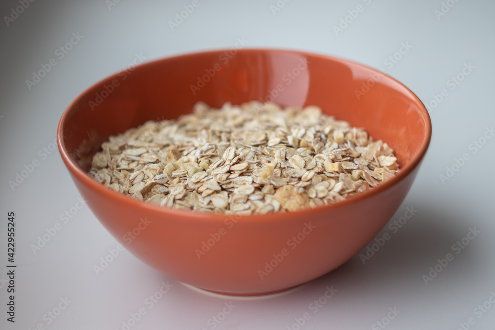 oatmeal in a brown cup close-up oatmeal in a brown cup close-up