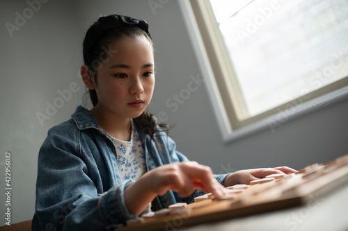 Elementary School Student as a Shogi (Japanese Chess) Player