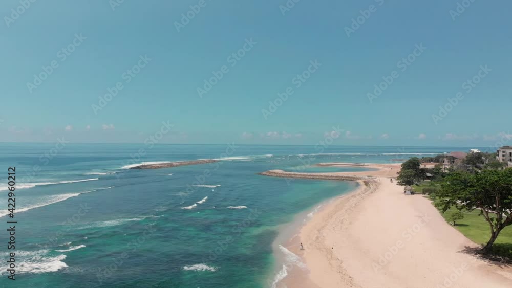 Drone coastline view. Ocean coast in asia. Beautiful scenic shot of sandy beach Drone coastline view. Ocean coast in asia. Beautiful scenic shot of sandy beach