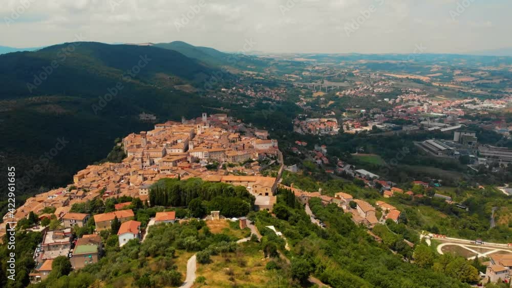 Aerial view of Albornoz fortress. Narni. Umbria. Italy. Summer sunny day. Concept of travel and vacation in Europe. Castle on top of the mountain Aerial view of Albornoz fortress. Narni. Umbria. Italy. Summer sunny day. Concept of travel and vacation in Europe. Castle on top of the mountain