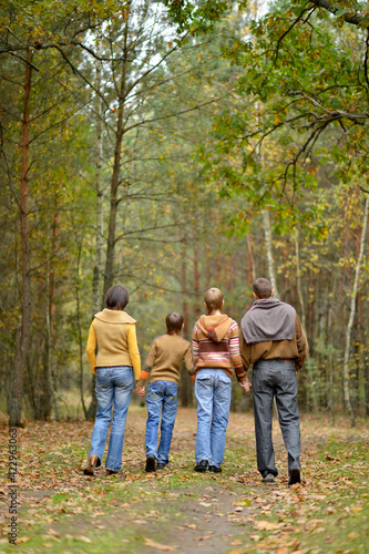 Family of four in park