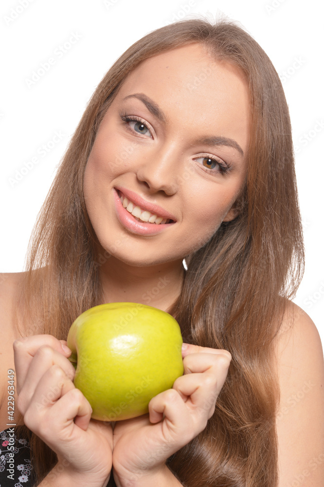 Portrait of beautiful young woman with green apple Portrait of beautiful young woman with green apple