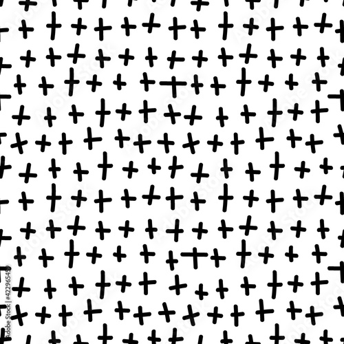 Crosses - pluses seamless pattern black and white color. Trendy minimalist decorative geometrical vector pattern. Hand drawn modern design for card, print on clothes. © Anna Eshka