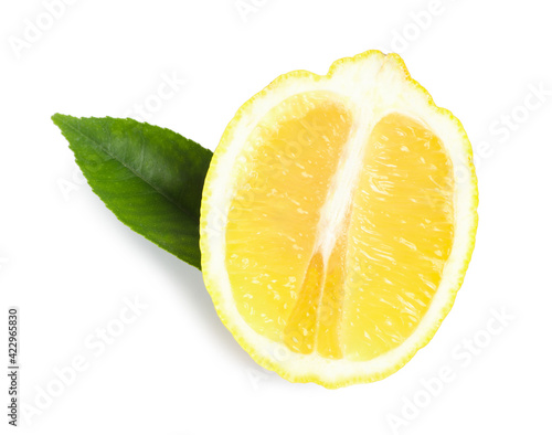 Fresh ripe lemon half with leaf on white background, top view