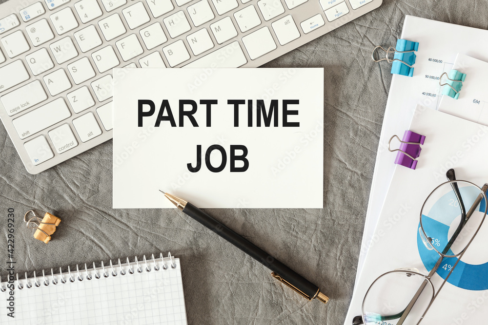 Part time job is written in a document on the office desk Part time job is written in a document on the office desk
