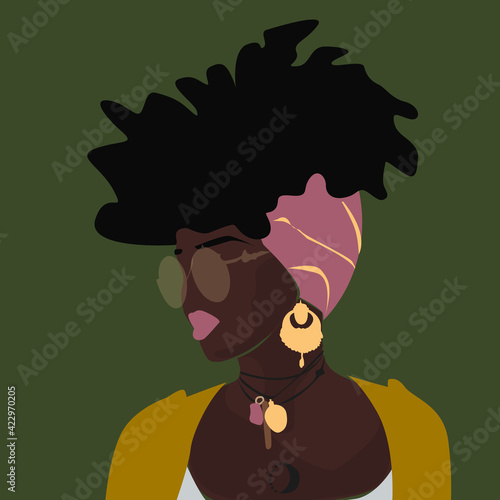 curly black woman in turban on olive background