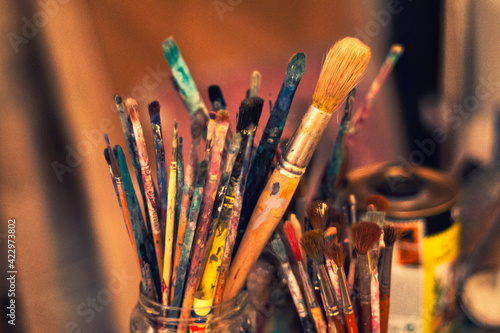 Used working tools of an artist (painter). Paint, brushes